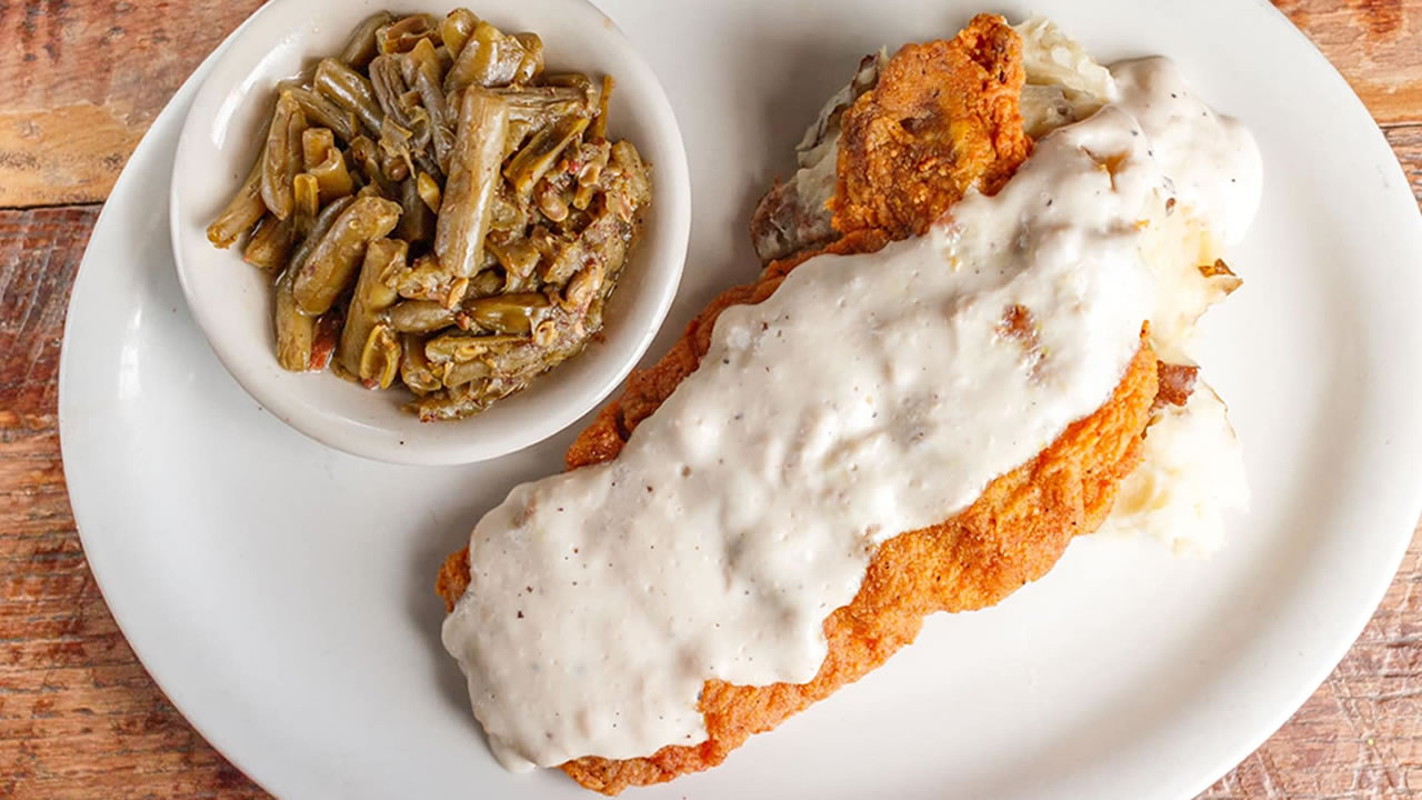 Chicken Fried Steak with Green Beans at Puckett's Restaurant